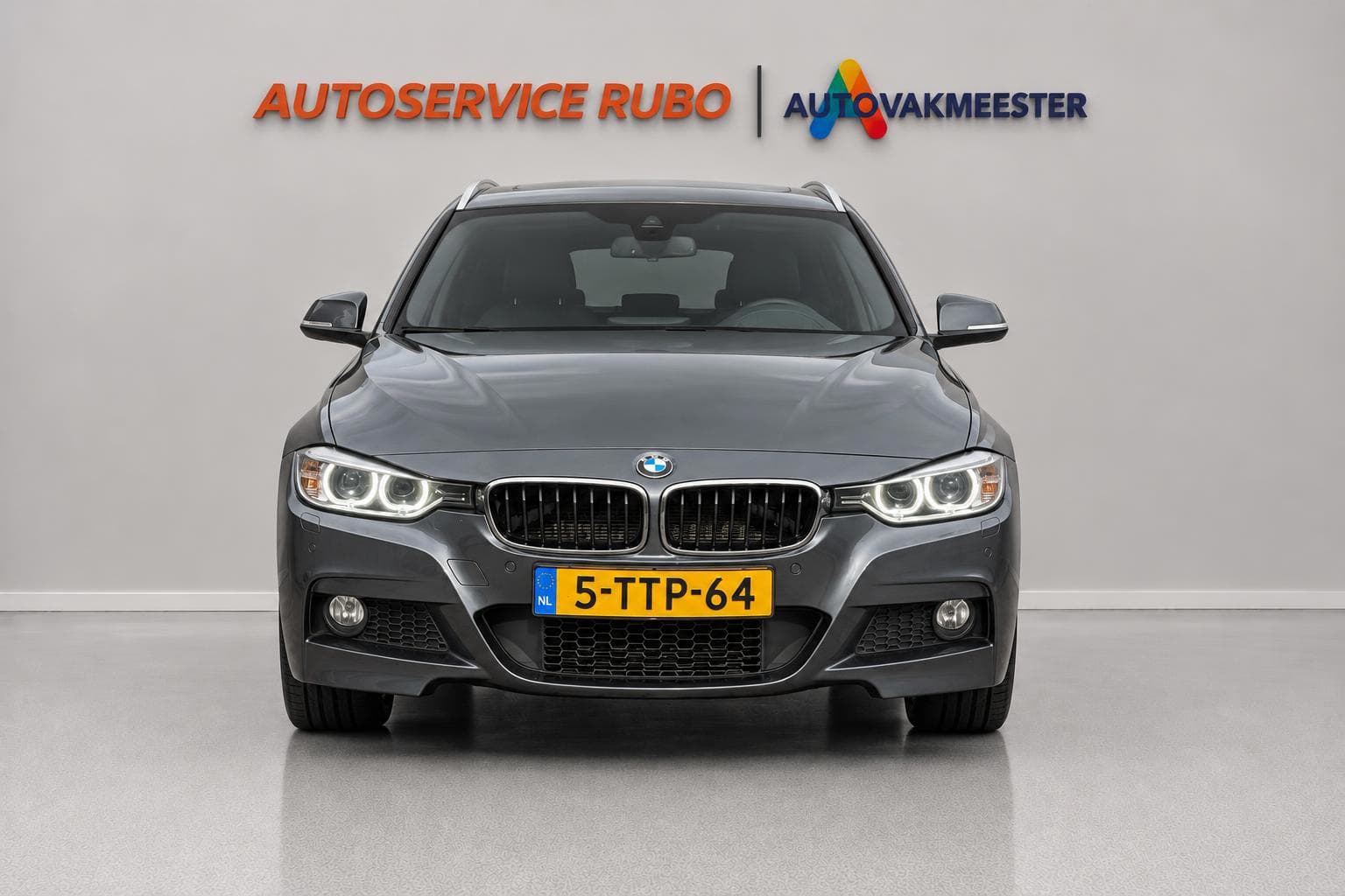 BMW 3 Serie Touring 335i High Executive 2014 foto 7